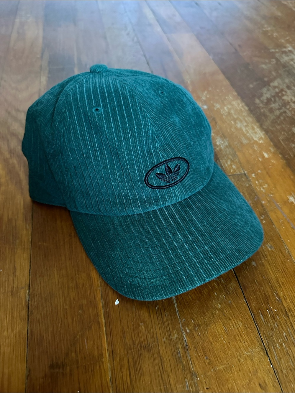 green corduroy adidas hat